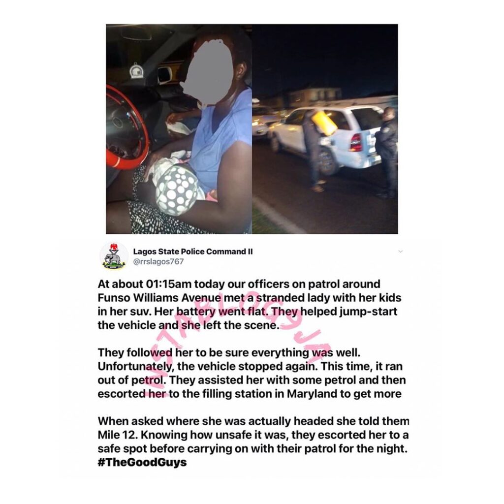 Police officers help a woman stranded with her kids in the middle of the night in Lagos State