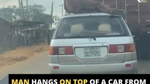 Man hangs on top of a car from Akure to Ore in Ondo State