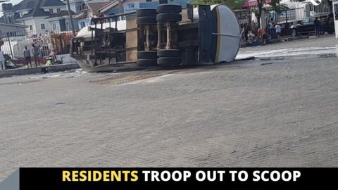 Residents troop out to scoop diesel from a fallen tanker in Amuwo Odofin, Lagos