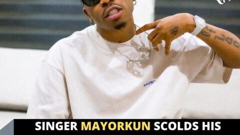 Singer Mayorkun scolds his pet for chewing his expensive gadget