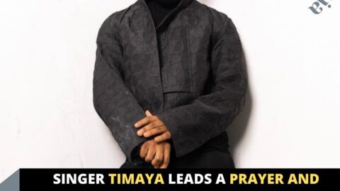 Singer Timaya leads a prayer and worship session during his performance at an event