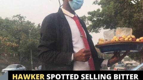 Hawker spotted selling bitter cola in suit, in Abuja